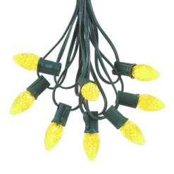 25 Light String Set With Yellow/Gold LED C7 Bulbs On Green Wire -Christmas Lights Series 0020497 25 light string set with yellowgold led c7 bulbs on green wire