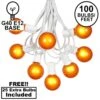 100 G40 Globe String Light Set With Orange Satin Bulbs On White Wire