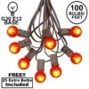 100 G30 Globe String Light Set With Orange Satin Bulbs On Brown Wire