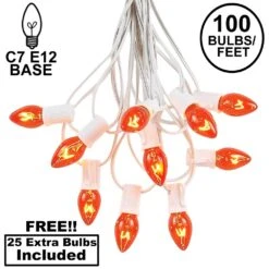 100 C7 String Light Set With Orange Bulbs On White Wire