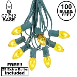 100 C7 String Light Set With Yellow Bulbs On Green Wire