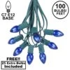 100 C7 String Light Set With Blue Bulbs On Green Wire