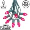 100 C7 String Light Set With Pink Bulbs On Green Wire