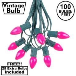 100 C7 String Light Set With Pink Ceramic Bulbs On Green Wire