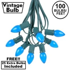 100 C7 String Light Set With Blue Ceramic Bulbs On Green Wire