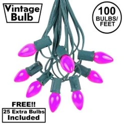 100 C7 String Light Set With Purple Ceramic Bulbs On Green Wire