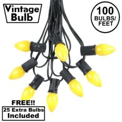 100 C7 String Light Set With Yellow Ceramic Bulbs On Black Wire
