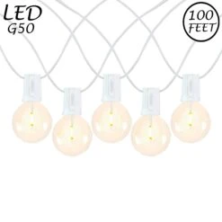 67 LED Filament G50 Globe String Light Set With Warm White Bulbs On White Wire