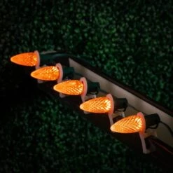 25 Light String Set With Amber (Orange) LED C9 Bulbs On Green Wire 17 25 Light String Set With Amber (Orange) LED C9 Bulbs On Green Wire -Christmas Lights Series 0032687 25 light string set with amber orange led c9 bulbs on green wire